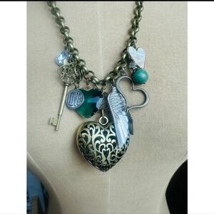 S18 Scooples Golden Heart Charm Necklace with Green Accents